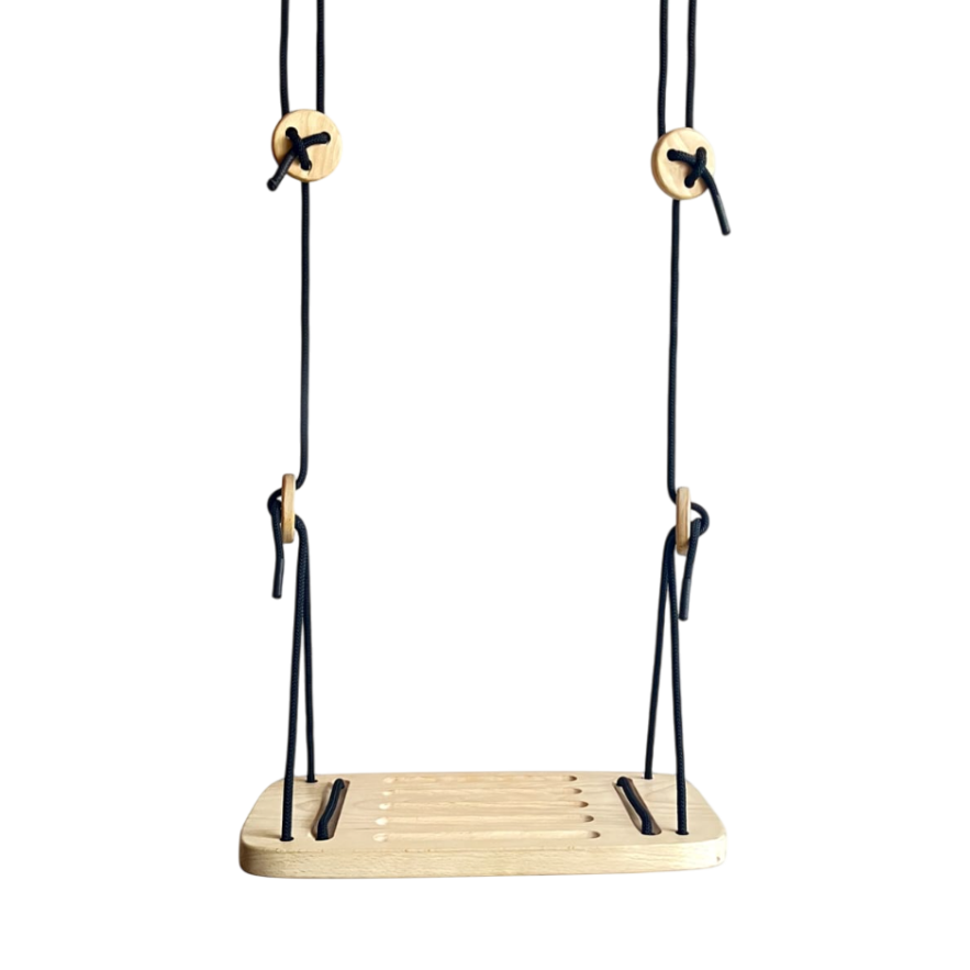 Wooden swing with black ropes on a white background