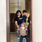 Woman with kids on swing